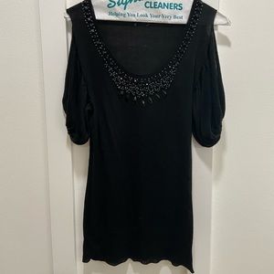Black beaded neckline top with cuffed waist and sleeves